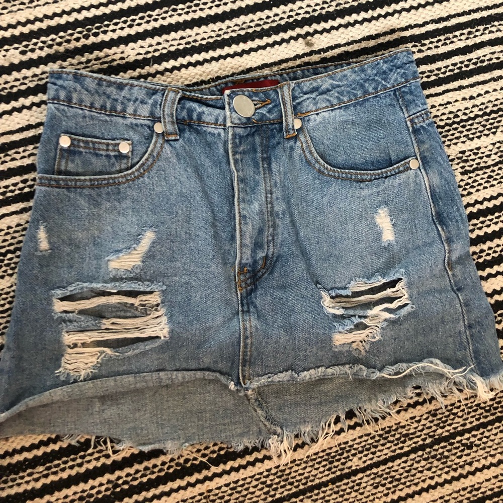 Distressed denim skirt